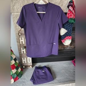 Pair of purple shadow fig scrubs